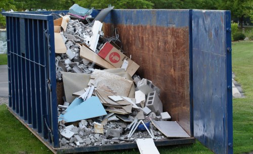 Construction debris being cleared at a Cricklewood site