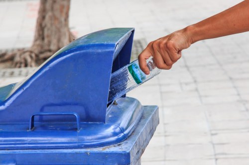 Workers sorting recyclables in a commercial facility